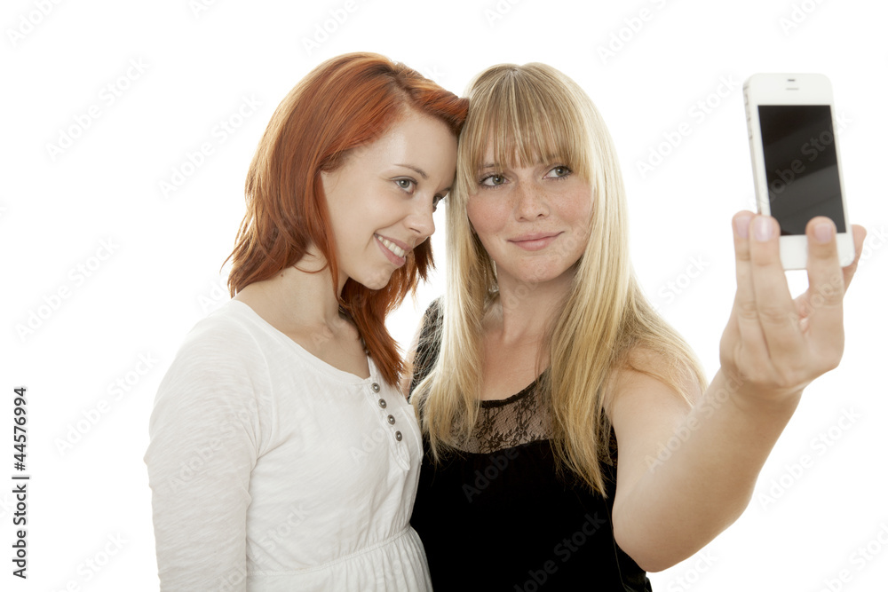 young beautiful red and blond haired girls photograph themself