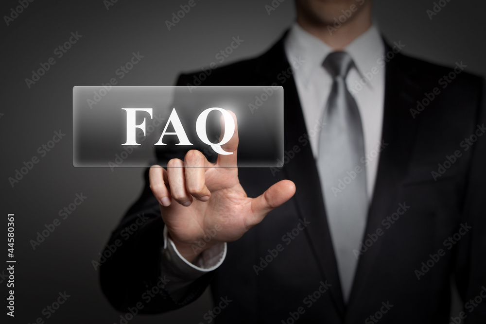 businessman pressing virtual button - FAQ businessman pressing virtual button - FAQ