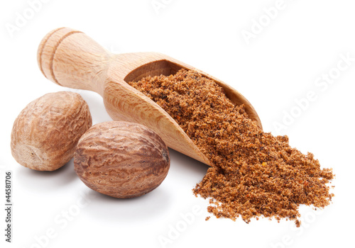 milled nutmeg isolated on white photo
