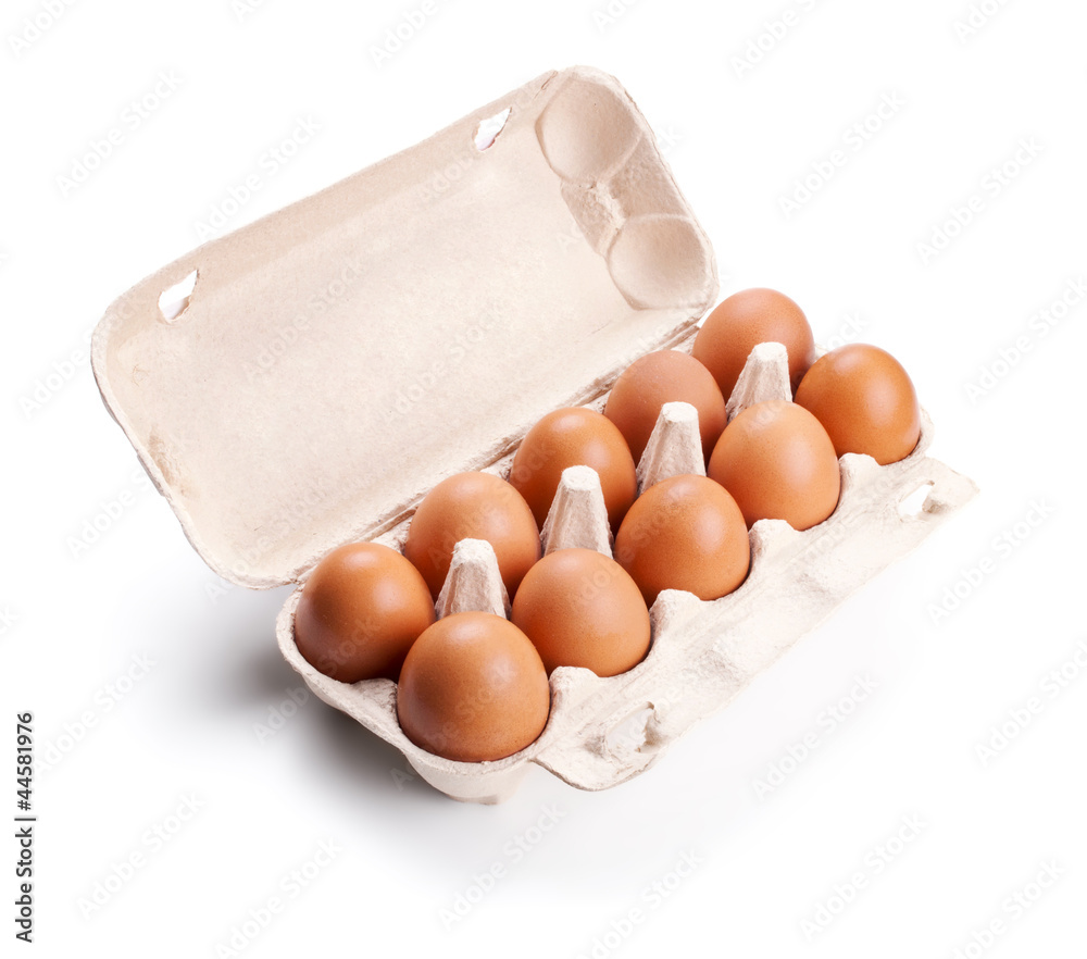 brown eggs in a carton package isolated on white