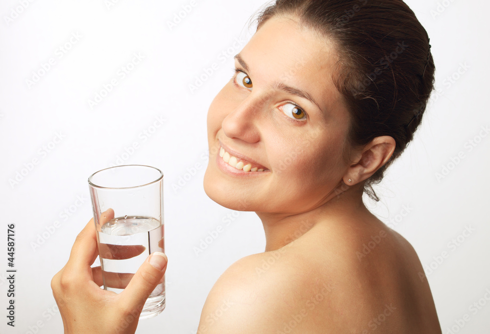 Young beautiful woman drinking water Young beautiful woman drinking water