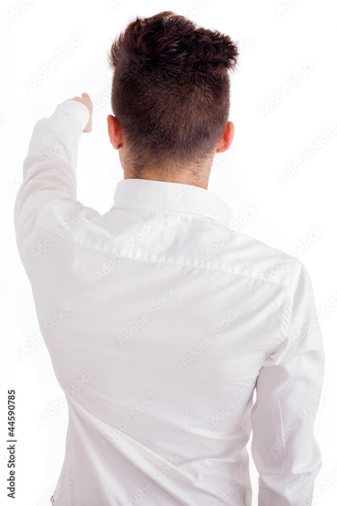 Young man from back pointing - isolated on white Young man from back pointing - isolated on white