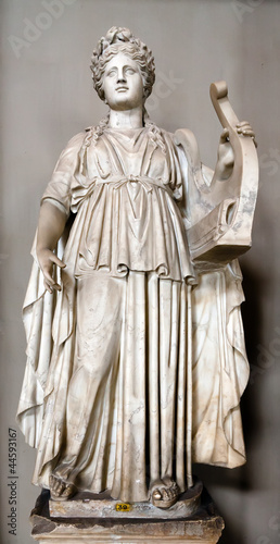Statue of Apollo holding a  lyre
