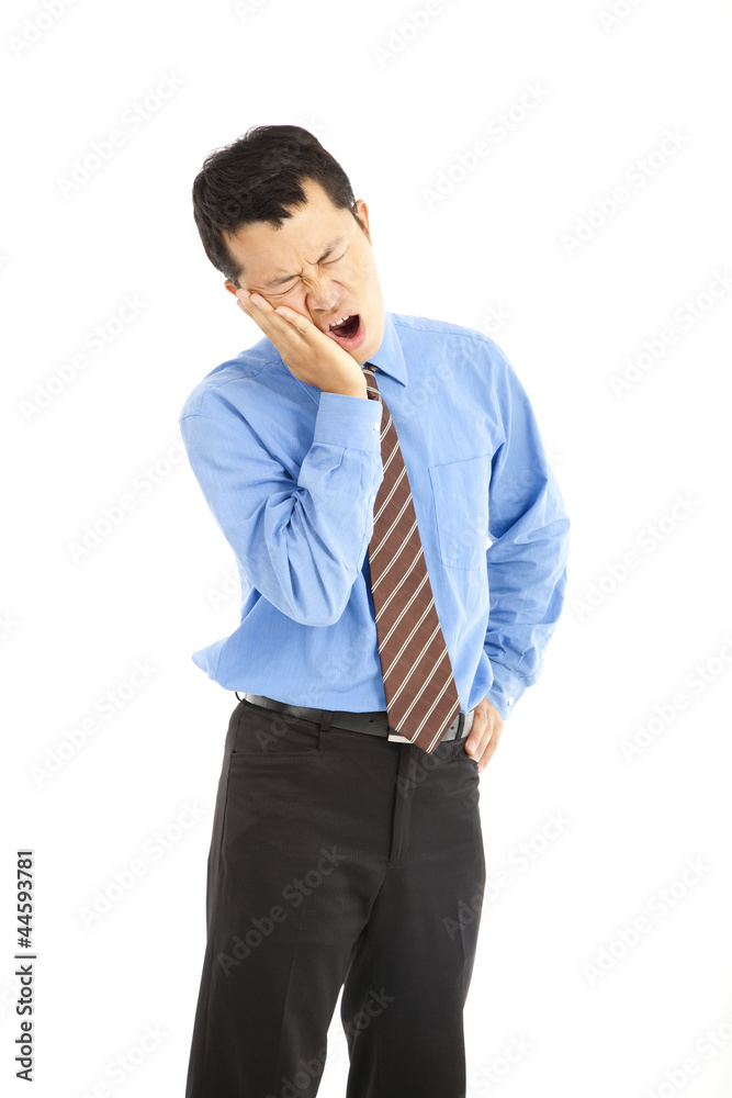 businessman in agony with a toothache businessman in agony with a toothache