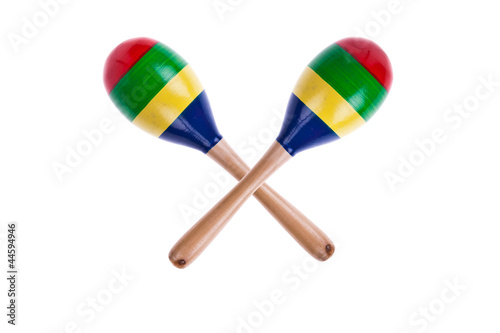 pair of colorful wooden maracas isolated on white background photo