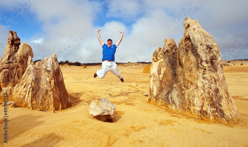 Jump in Pinnacles Desert, Australia photo