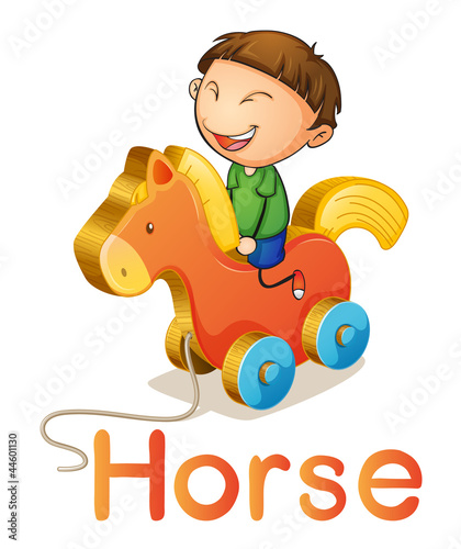 a boy on a toy horse
