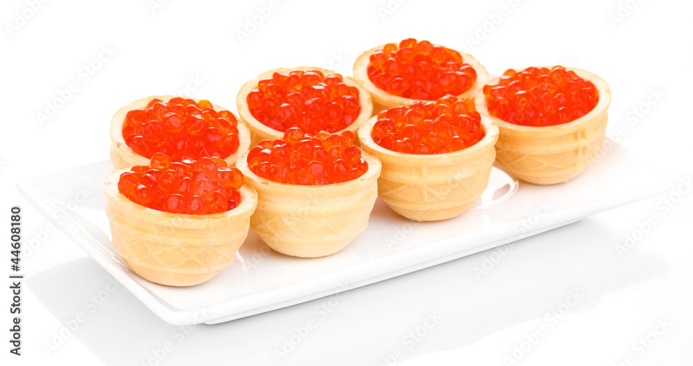 Red caviar in tartlets on white plate isolated on white Red caviar in tartlets on white plate isolated on white