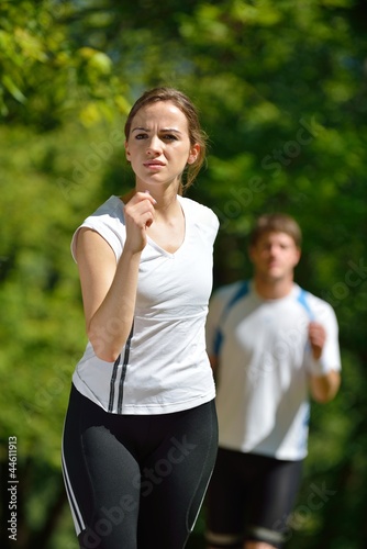 Young couple jogging at morning