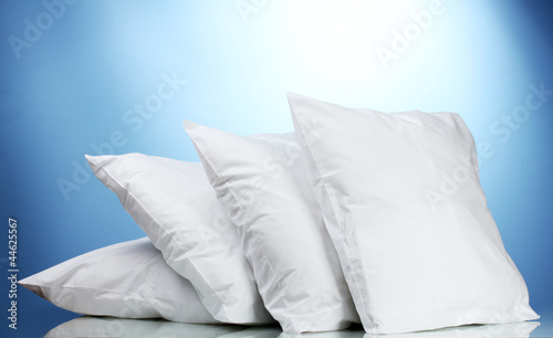 Fototapeta Naklejka Na Ścianę i Meble -  pillows, on blue background