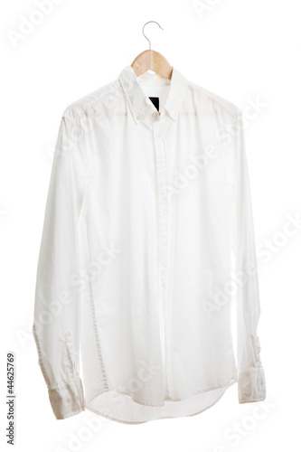 shirt on wooden hanger isolated on white