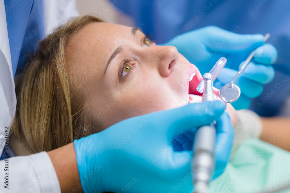 Dental check-up close-up female mouth Dental check-up close-up female mouth