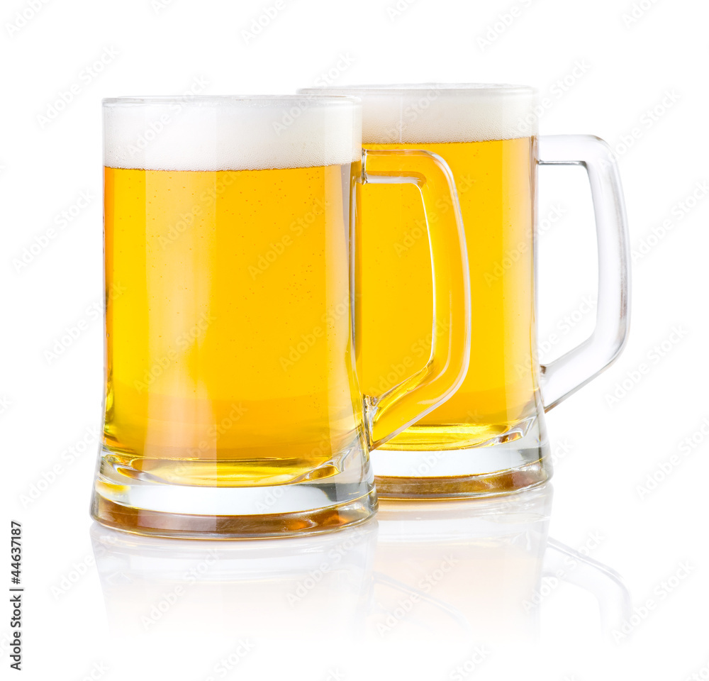 Two glasses of fresh beer with foam isolated on white background Two glasses of fresh beer with foam isolated on white background