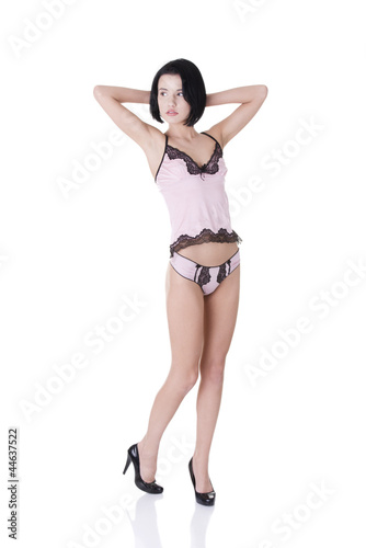 Young woman in pink underwear