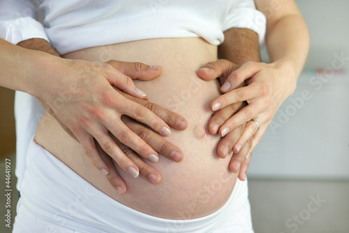 Wallpaper Mural Couple hugging pregnant belly Torontodigital.ca