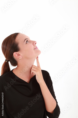 Portrait of thinking young woman