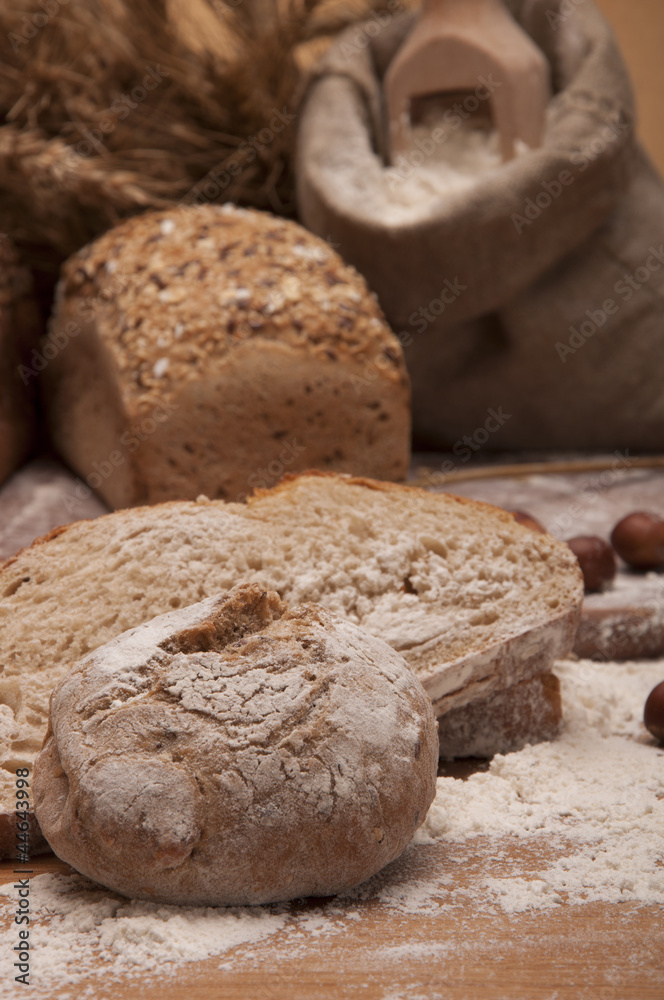 Rolls and bread with flour and cereals