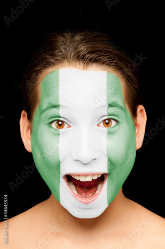 Fotografie girl with nigerian flag painted on her face