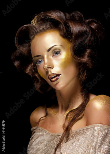 Fashion style. Art. Gold woman face - glamour luxury makeup