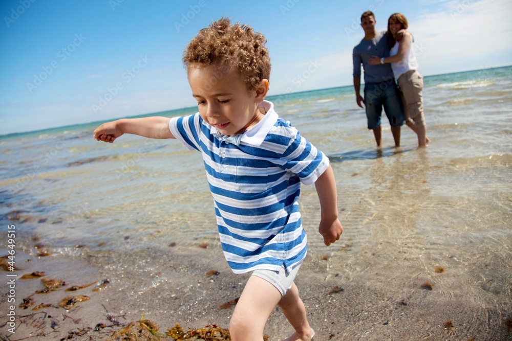Young Family on a Tropical Beach Young Family on a Tropical Beach