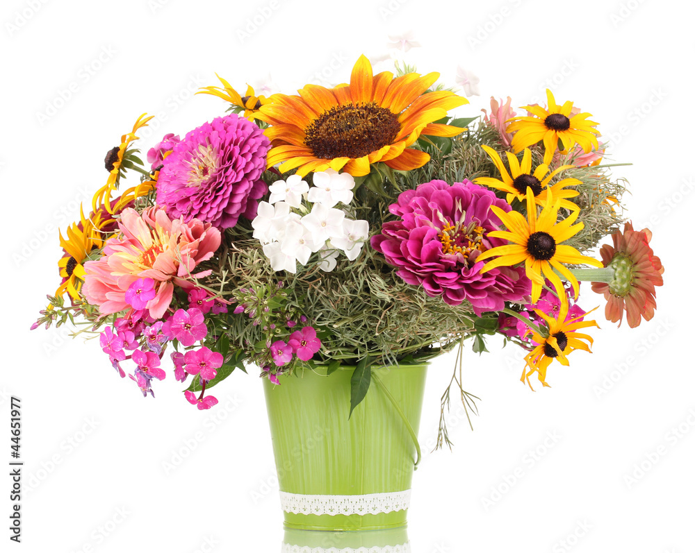 Fototapeta premium Beautiful bouquet of bright flowers in pail isolated on white