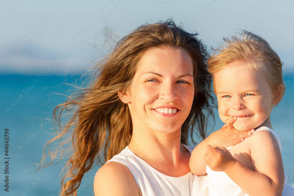Mother and daughter on the beach