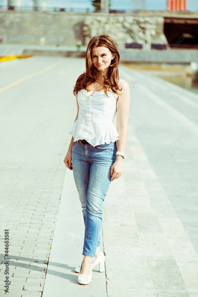 Portrait of a beautiful european woman smiling outdoors Portrait of a beautiful european woman smiling outdoors