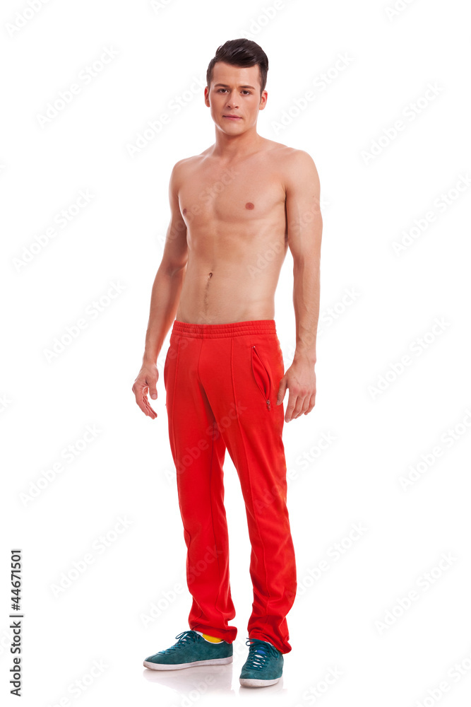 Fototapeta premium young handsome muscular guy looking at the camera