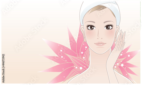 Beautiful young woman touching her face after beauty treatment