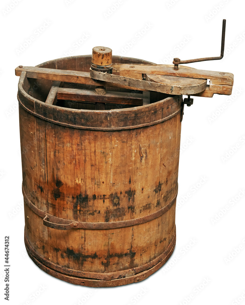 Old wooden honey extractor. Clipping path included. Old wooden honey extractor. Clipping path included.
