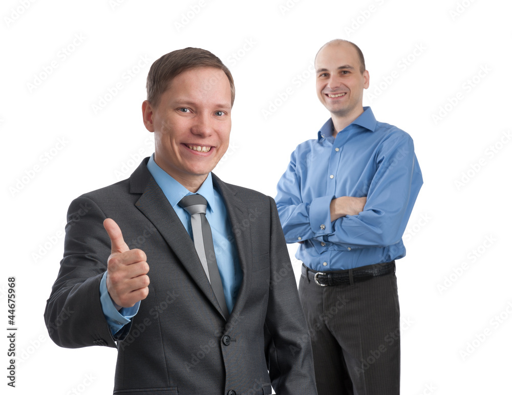smiling young business man with thumbs up gesture smiling young business man with thumbs up gesture