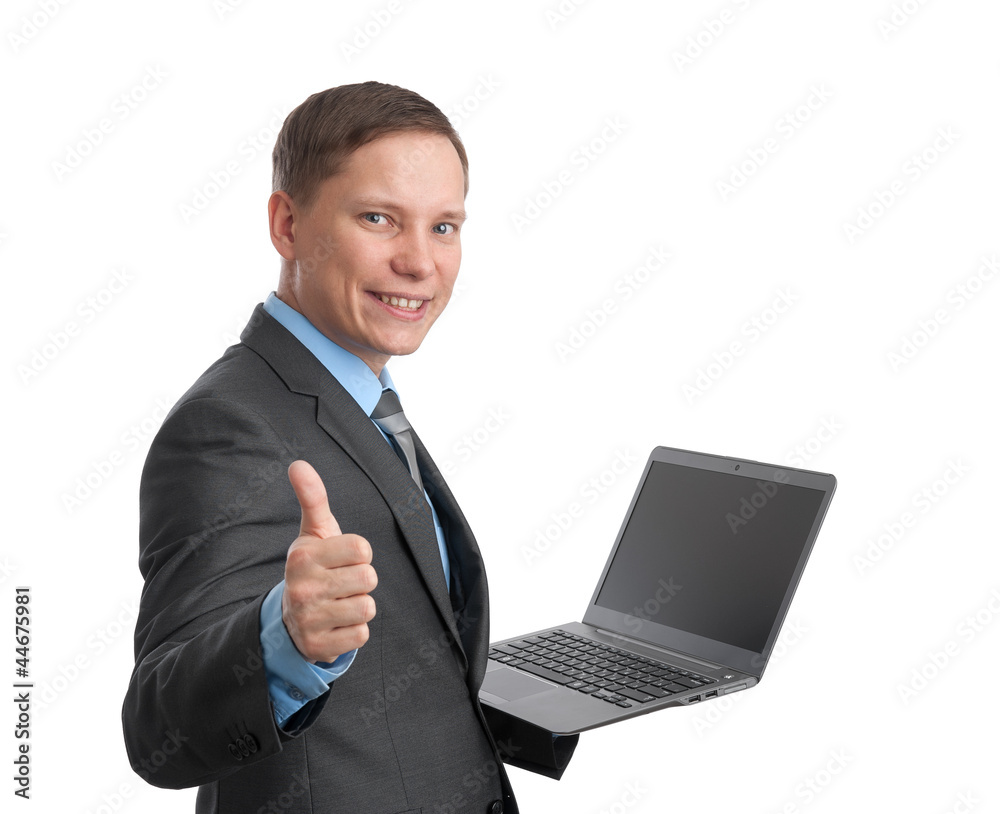 business man holding laptop computer and showing thumb up business man holding laptop computer and showing thumb up