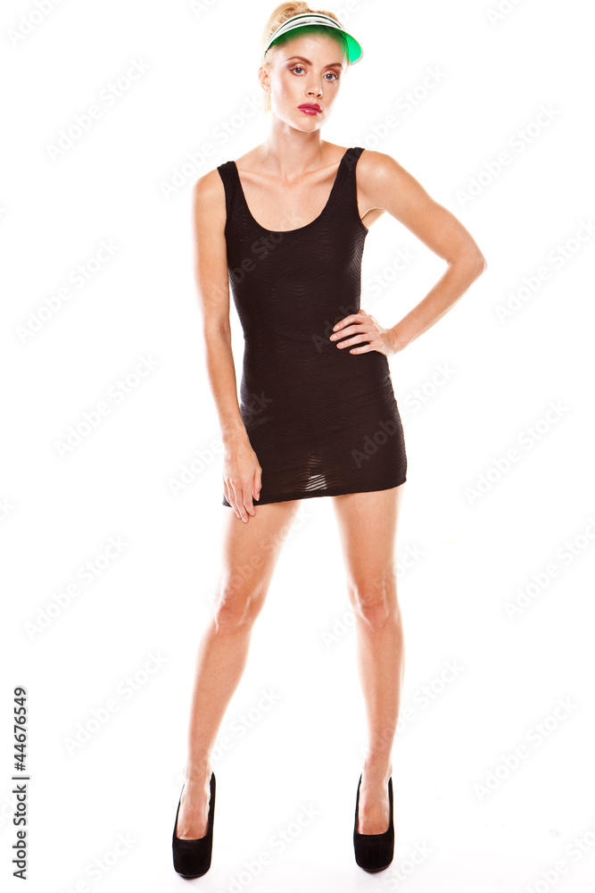 Fototapeta premium Woman posing in black miniskirt