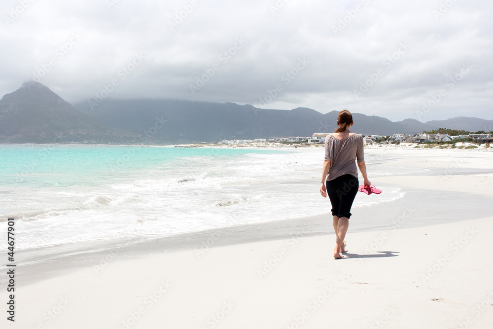 Beach of Kommetjie with an upcoming storm in the background