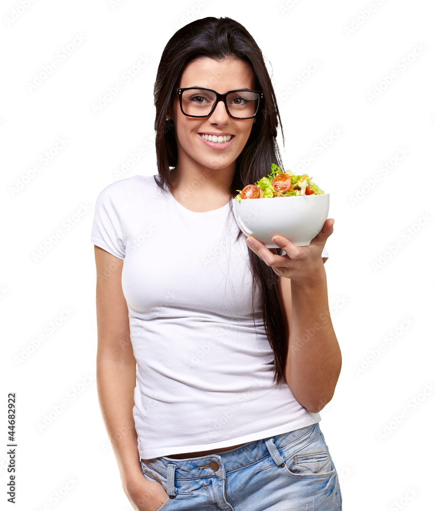 Young Girl Showing A Bowl Of Salad