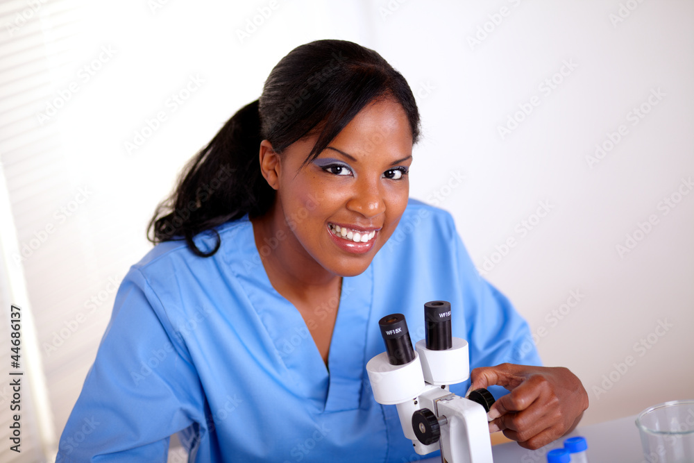 Beautiful scientific woman looking at you Beautiful scientific woman looking at you