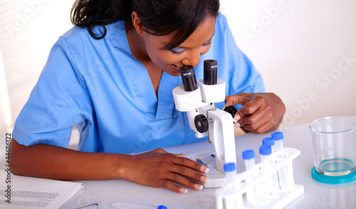 Dedicated scientific woman working at laboratory