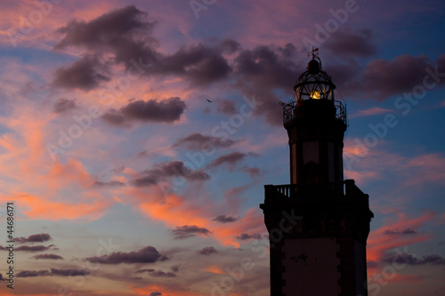 Lighthouse at dusk photo