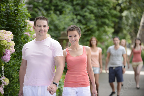 group of couples on a walk outdoors