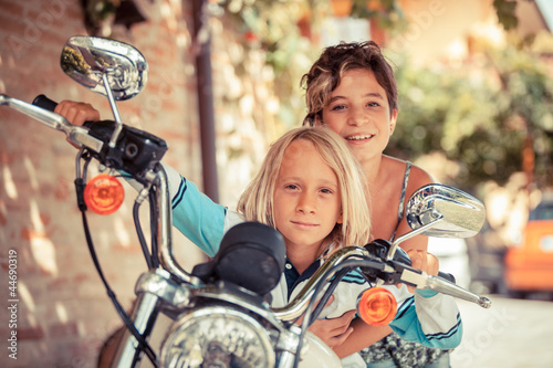 Couple of Children with Motorbike