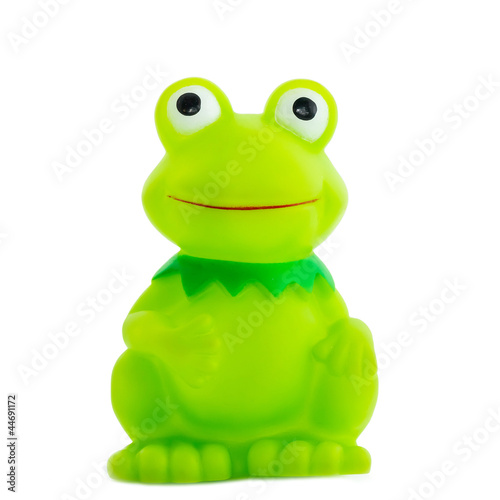 The toy Cheerful green frog smiles.2