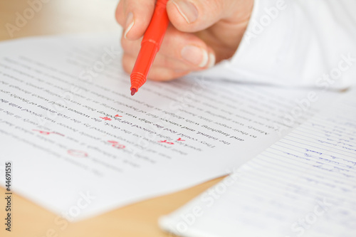 Obraz na płótnie Proofreader checks a transcribed page of text