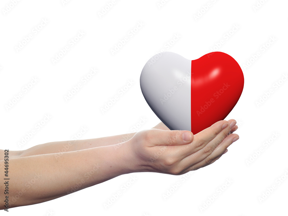 Obraz premium 3D red heart held in hands by an adult male