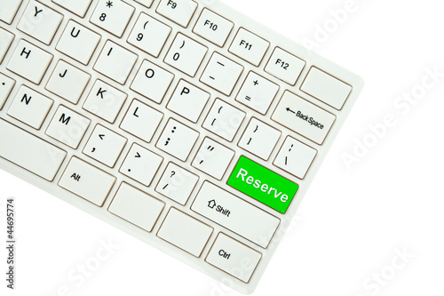 Wording Reserve on computer keyboard isolated on white backgroun