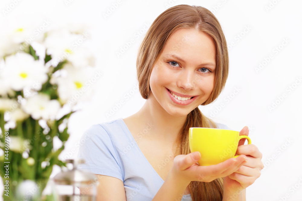 Beautiful young woman drinking tea Beautiful young woman drinking tea