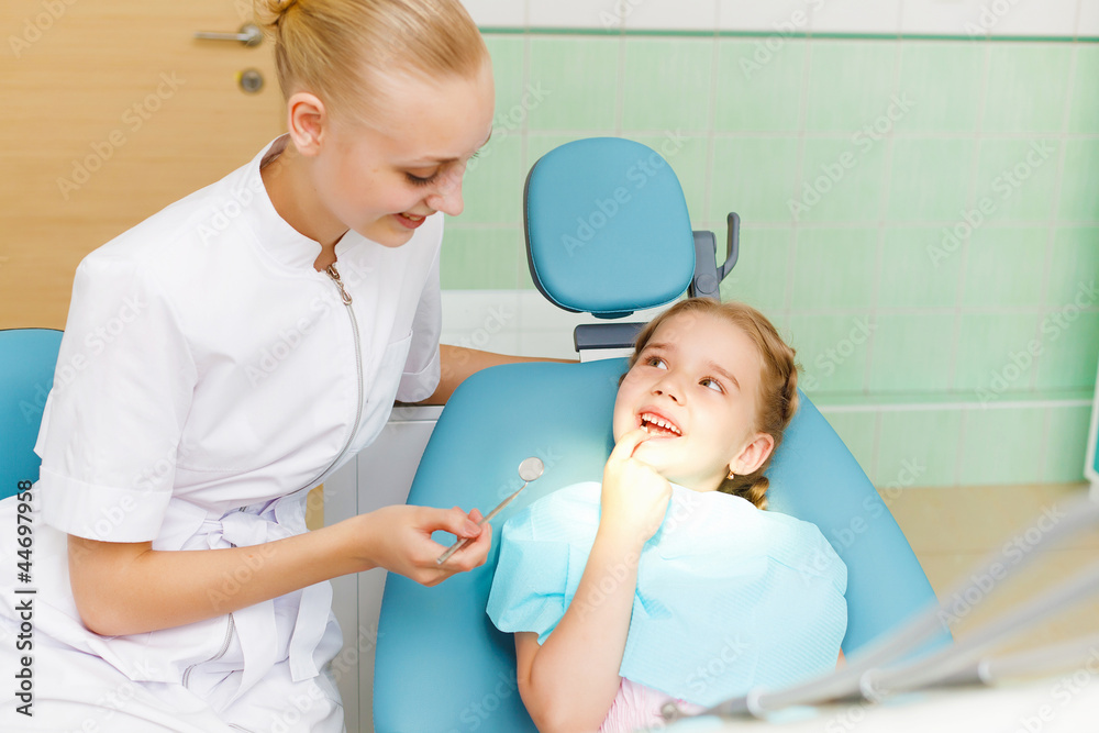 Little girl visiting dentist Little girl visiting dentist