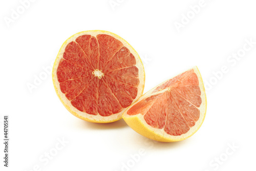 Half and slice of grapefruit