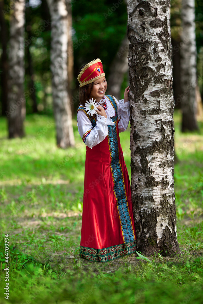 The girl in the Park playing hide and seek