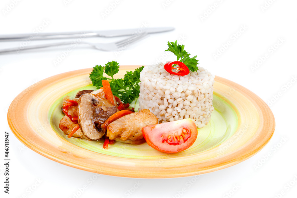 Fried mushrooms with chicken and vegetables, served with pearl b Fried mushrooms with chicken and vegetables, served with pearl b