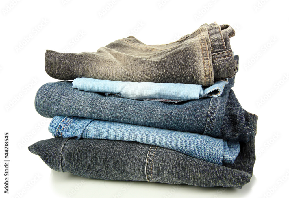 Lot of different jeans isolated on white Lot of different jeans isolated on white